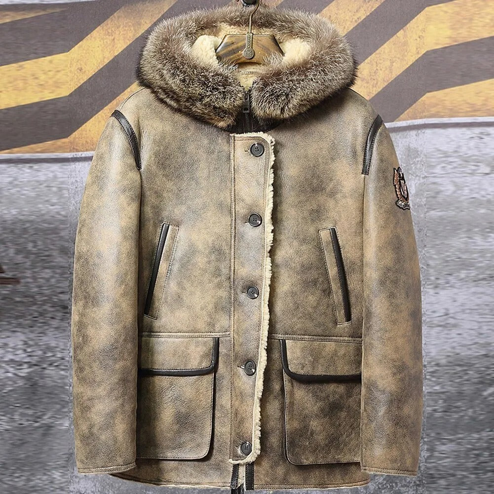 Nouveau manteau en peau de mouton à capuche pour homme avec col en fourrure de raton laveur